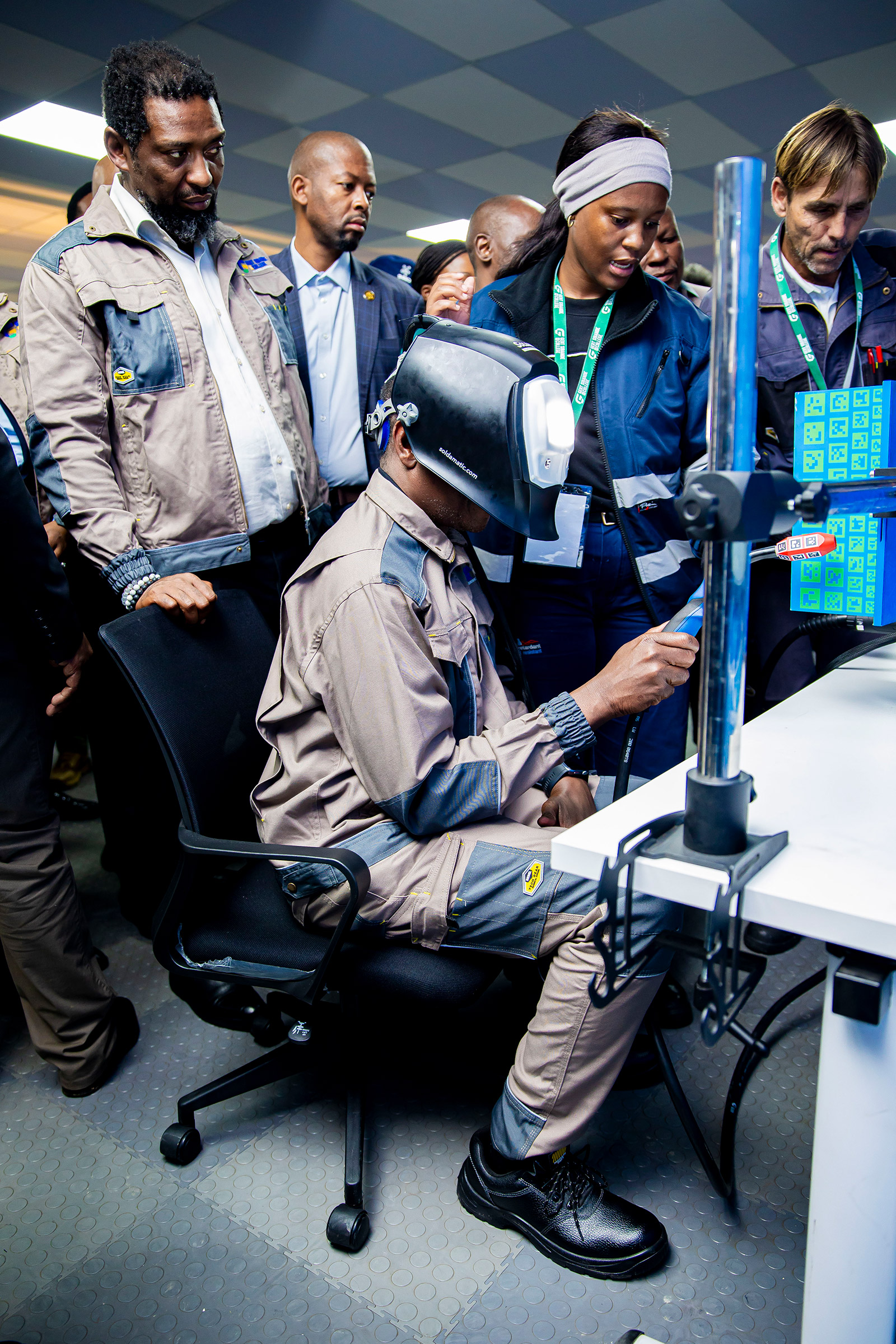 Learners using digital equipment at the 4IR Laboratory at Gert Sibande TVET College.